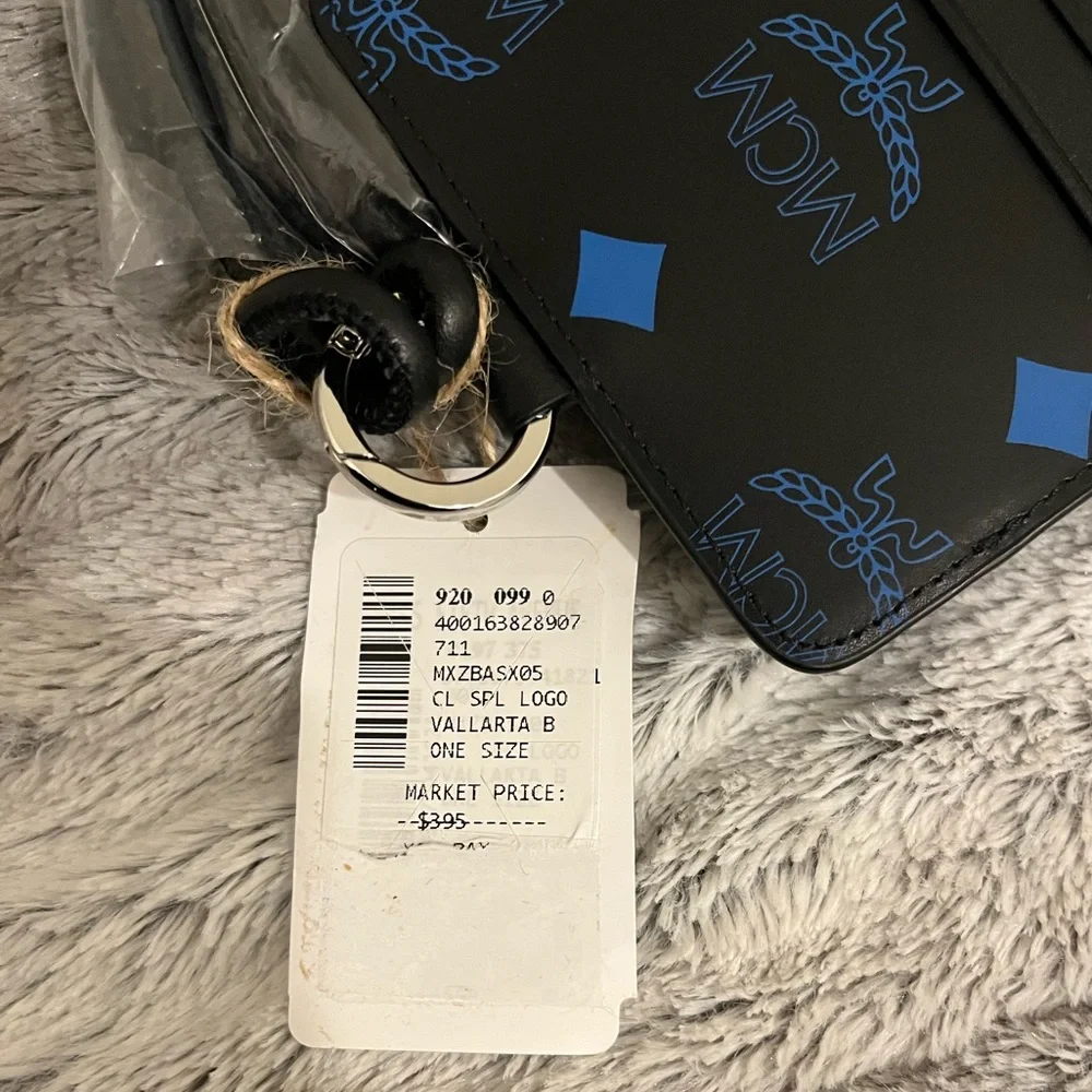 NEW NWT MCM LOGO PHONE LANYARD VALLARTA BLUE BLACK AUTHENTIC INCL SAKS TAG
